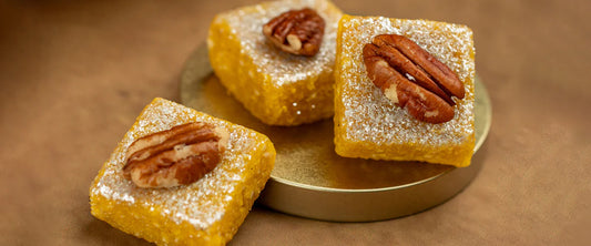 Delicious Indian sweets topped with crunchy pecan nuts