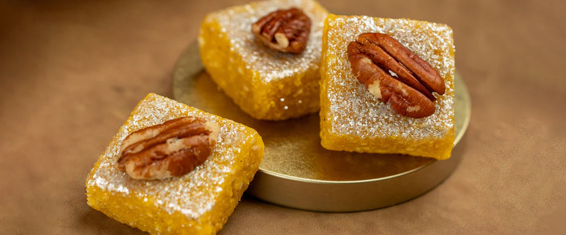 Delicious Indian sweets topped with crunchy pecan nuts
